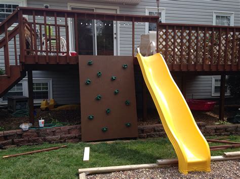 Backyard deck project for the kids. Rock wall and slide. Backyard Hammock, Backyard Garden ...