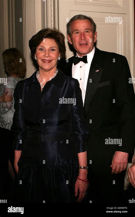 President George W Bush and Laura Bush arrive in the East Room to Stock ...