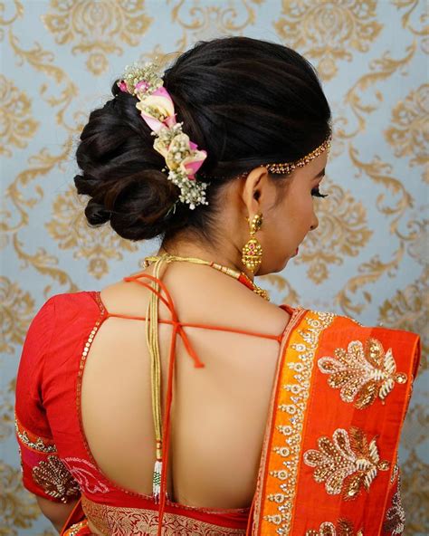 Pin by PRADEEP RAY on GAJARA HAIR BUN | Saree draping styles, Hair ...