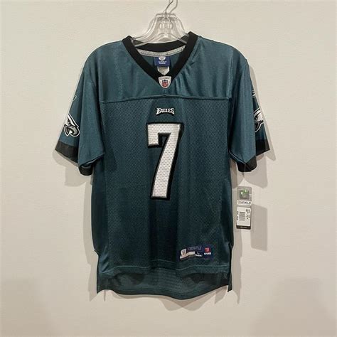 2000s Michael Vick Eagles jersey. NWT . . Teen size... - Depop