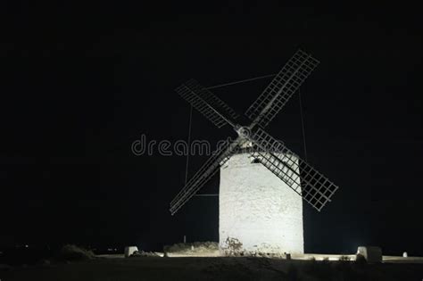 Illuminated History: Windmills of Consuegra in Toledo Shine at Night Stock Photo - Image of ...