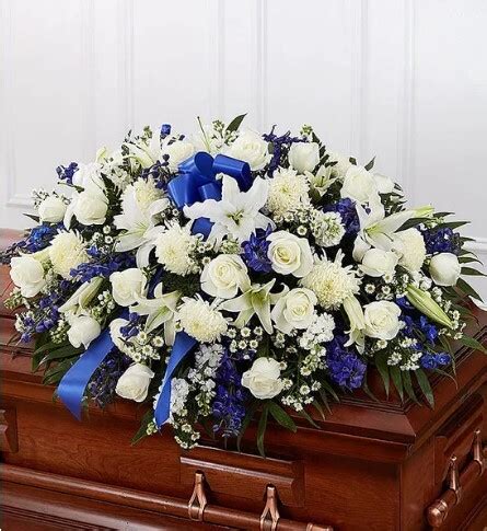 Accents of Blue Funeral Casket Spray c2469 | Funeral Flower Arrangements