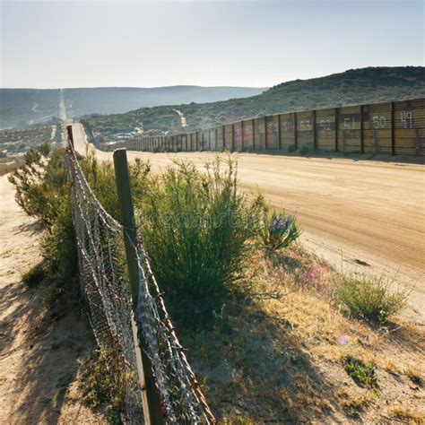 US/Mexico Border Fence stock image. Image of immigration - 19733747