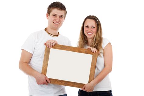 Couple With Blank Frame Free Stock Photo - Public Domain Pictures