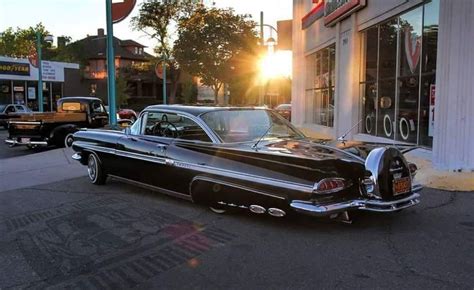 Vintage Black Car at Sunset