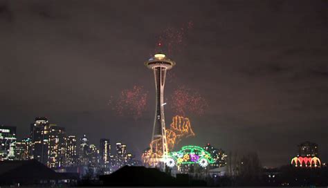 Space Needle blending live New Year's fireworks with an augmented ...