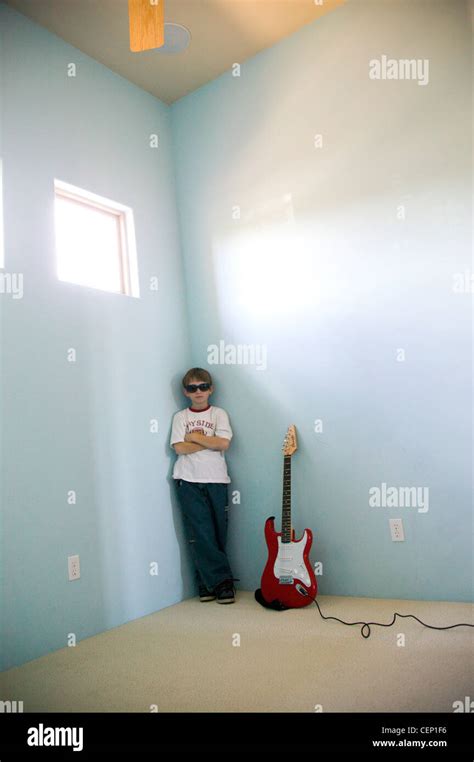 Young Boy Playing Electric Guitar Stock Photo - Alamy