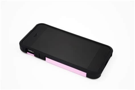 Black smartphone with a pink case 1740292 Stock Photo at Vecteezy