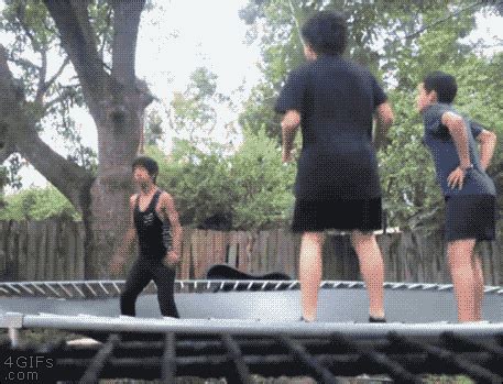 Falls-head-first-through-trampoline