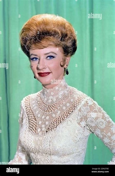 GUNSMOKE CBS TV series 1955-1975 with Amanda Blake as Miss Kitty Russell about 1967 Stock Photo ...