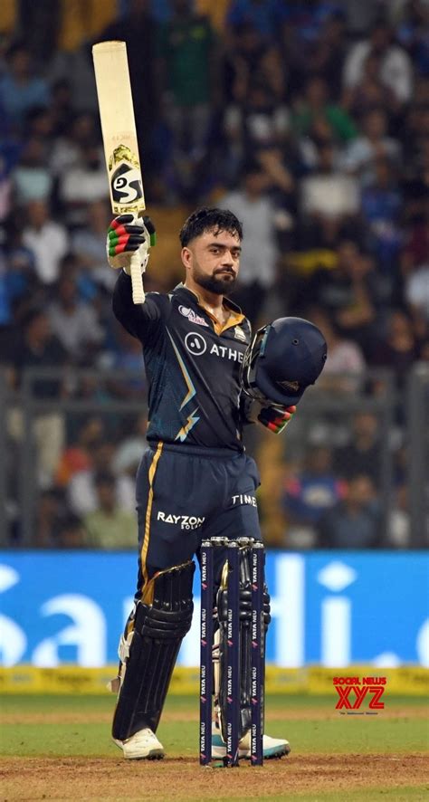 Mumbai : GT's Rashid Khan celebrates his half - century during the IPL 2023 match #Gallery ...