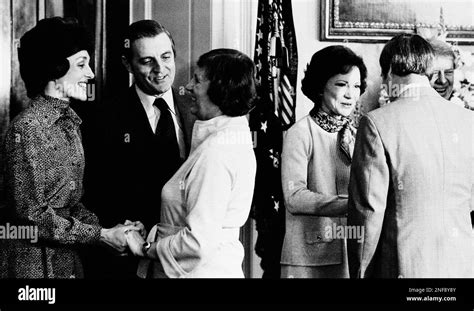 Connecticut Gov. Ella Grasso, center, is greeted by Vice Pres. Walter Mondale and his wife Joan ...