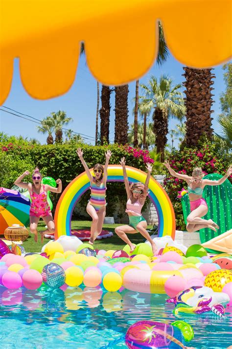 An Epic Rainbow Balloon Pool Party | Pool birthday party, Girls pool parties, Pool party