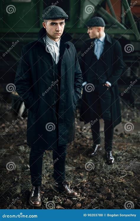 Stylish Gangster Men in Retro Clothes Posing on Background of Ra Stock ...