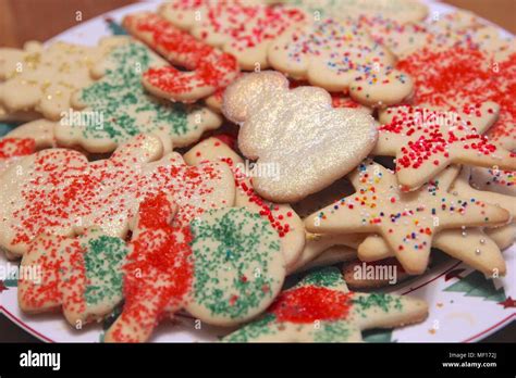 Plateful of Christmas cookies decorated with colorful sprinkles and ...