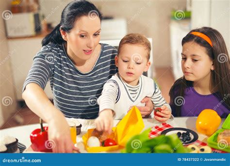 Mother Making Breakfast for Her Children Stock Photo - Image of backpack, meal: 78437322