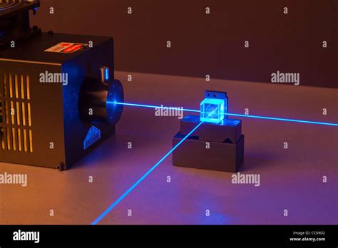 argon ion laser beam passing through a beam splitter Stock Photo - Alamy