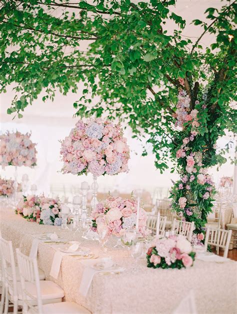 Lavish Pink Rose Arrangements with Blush Linens