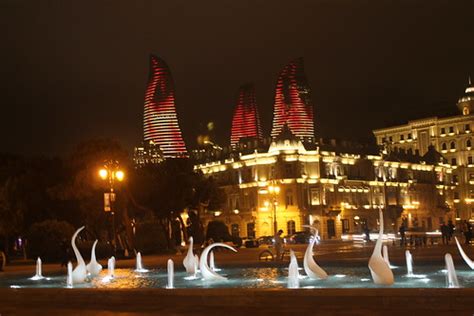 Fountain and Flame Towers at night | Robert Wilson | Flickr