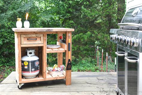 Give yourself some extra room and storage next to your grill with this ...