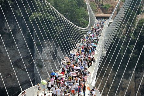 World’s highest and longest glass bridge open in China - Business Insider