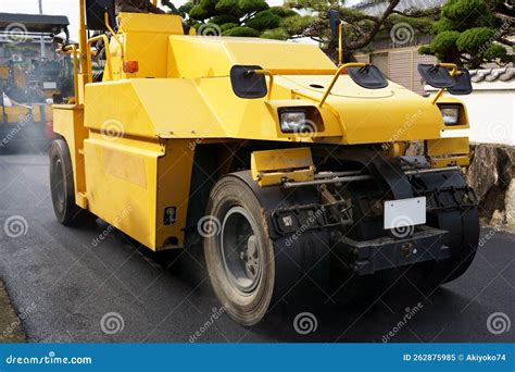 Pneumatic Roller of Tires Compacting New Asphalt Stock Image - Image of ...