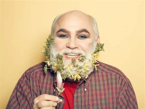 old man with flowers and leaves in beard - Stock Image - Everypixel