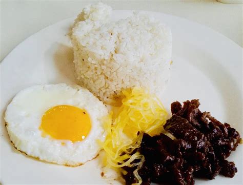 Tapsilog: A Filipino Breakfast Combo (Rice and Eggs) - Photos