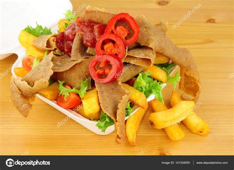 Doner Kebab Meat And Chips In A Take Away Box Stock Photo by ©philkinsey 141334050