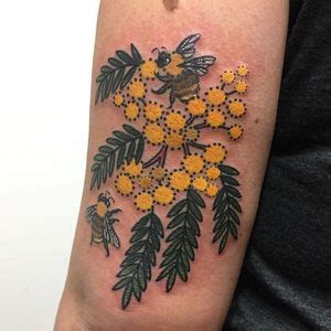 Tattoo uploaded by Stacie Mayer • Kangaroo paw and golden wattle tattoo by Tan Van Den Broek. # ...