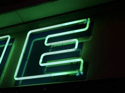 Letter E, neon sign on a shop - Download Abstract