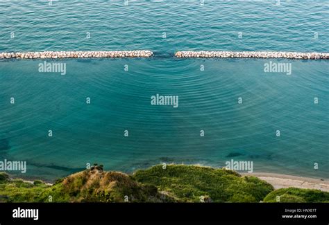 Diffraction waves in the sea seen along the coastline near Pesaro Stock Photo - Alamy