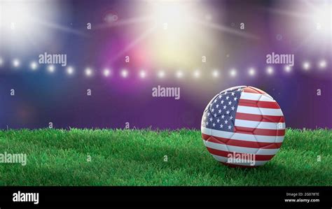 Soccer ball in flag colors on a bright blurred stadium background. USA ...