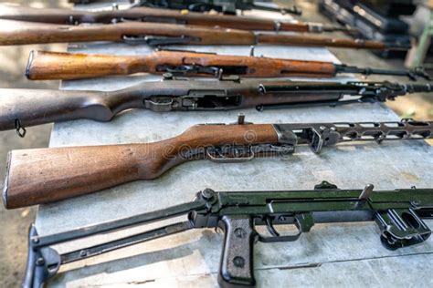 Collection of Historical and Modern Weapons on the Shooting Range Stock ...