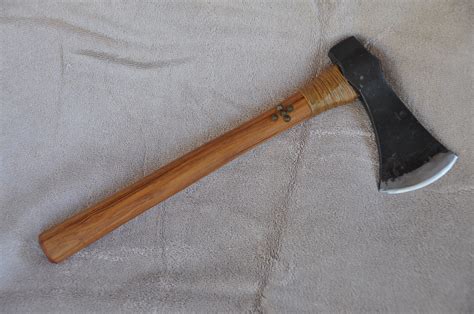 Pin on Tomahawks and axes