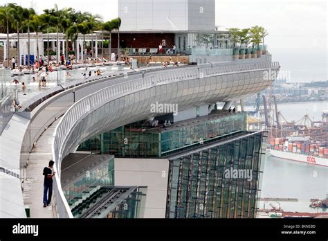 The Marina Bay Sands Resort Hotel in Singapore. Swimming pool on top of the Hotel Stock Photo ...