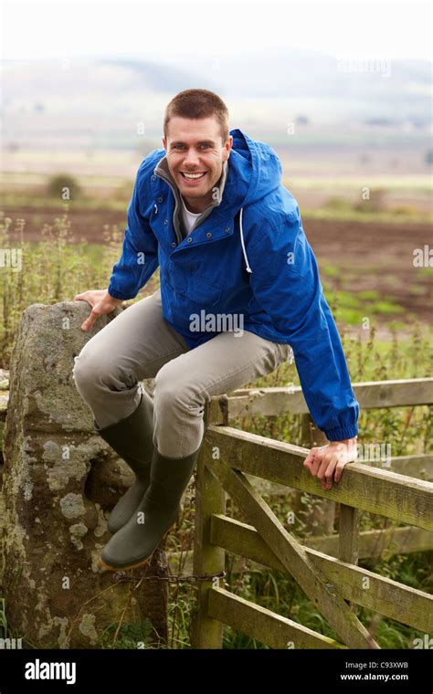 Man jumping over fence hi-res stock photography and images - Alamy