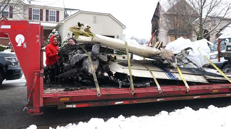 Remains of New Hudson plane crash hauled away