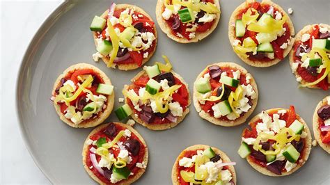 Mini Greek Pita Pizzas Recipe - Tablespoon.com