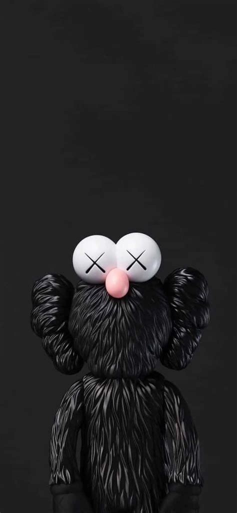 Download Kaws Black And White Pink Nose Wallpaper | Wallpapers.com