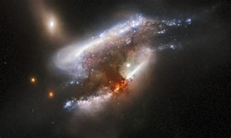 Incredible NASA Image Shows Three Galaxies Colliding 682 Million Light-Years Away - Newsweek