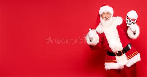 Santa Claus Holding Halloween Skull Mask Stock Image - Image of claus, elderly: 198781551