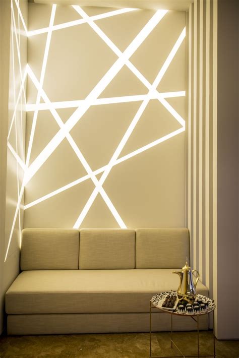 Love this look? Use strip light channels in drywall to achieve it. #lightingdesign | Modern wall ...