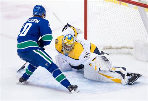 Canucks’ Elias Pettersson scores penalty-shot winner against Predators ...