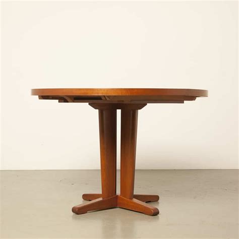 Round mahogany extendable dining room table ⋆ Neef Louis Design Amsterdam