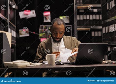 Police Detective Searching Evidence in Crime Case File Stock Photo - Image of crime, read: 285901522