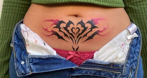 25 Womb Tattoos Symbolizing the Miracle of Creation