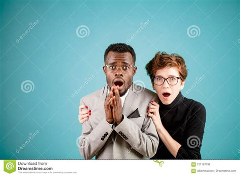 Close Up Portrait of Two Young People Watching Horror Film Stock Photo ...