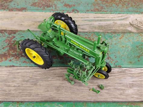 John Deere Model A Tractor with Cultivator - Gavel Roads Online Auctions