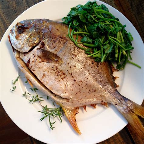 Broiled pompano stuffed with fresh herbs and served with blanched watercress | Baked fish, No ...